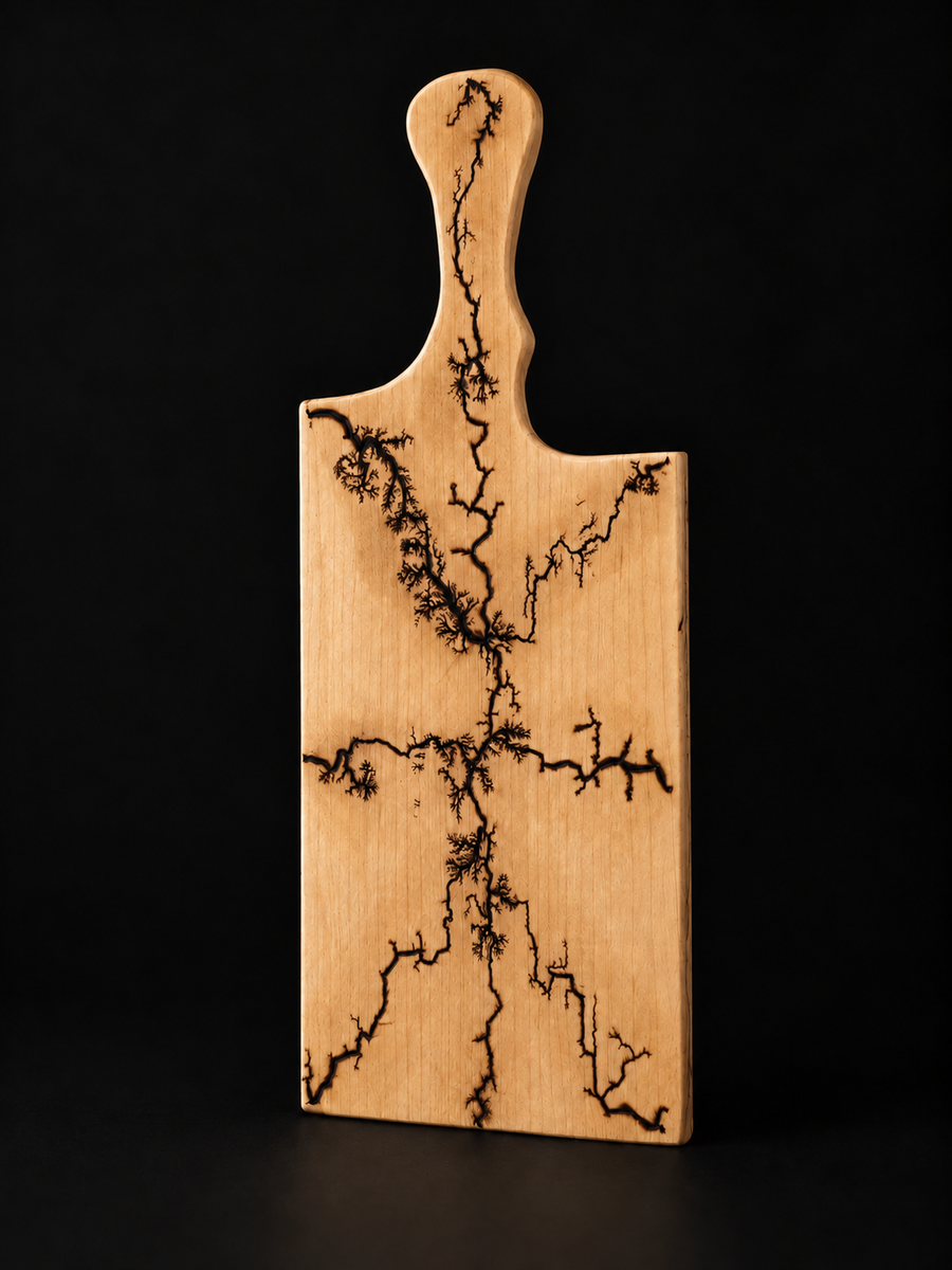 Fractal-burn maple paddle — digitally enhanced light oil-finish preview on black